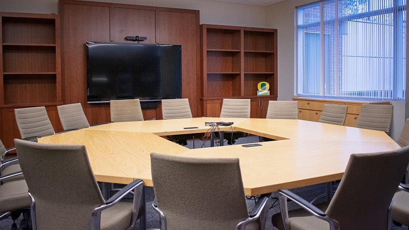 Conference room 108 also features video conferencing and a large window. 