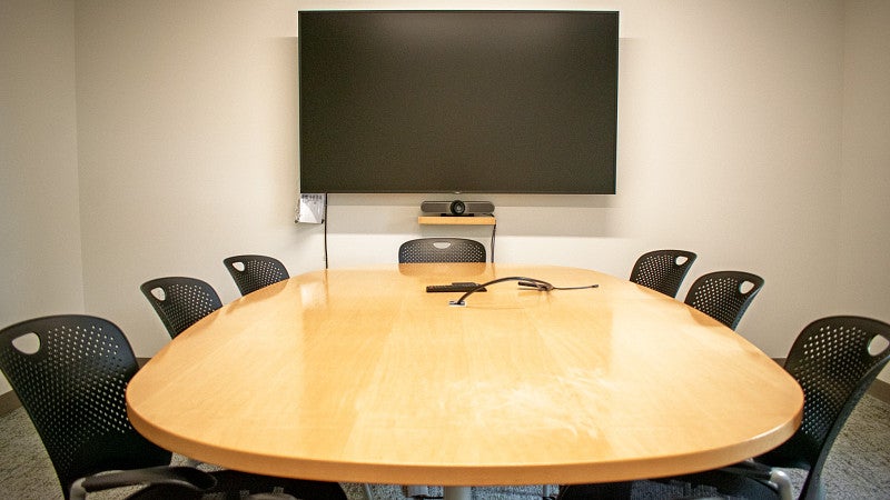 Small conference room seats eight