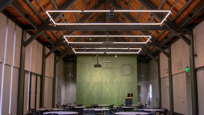 The Innovation Commons set with round tables. 