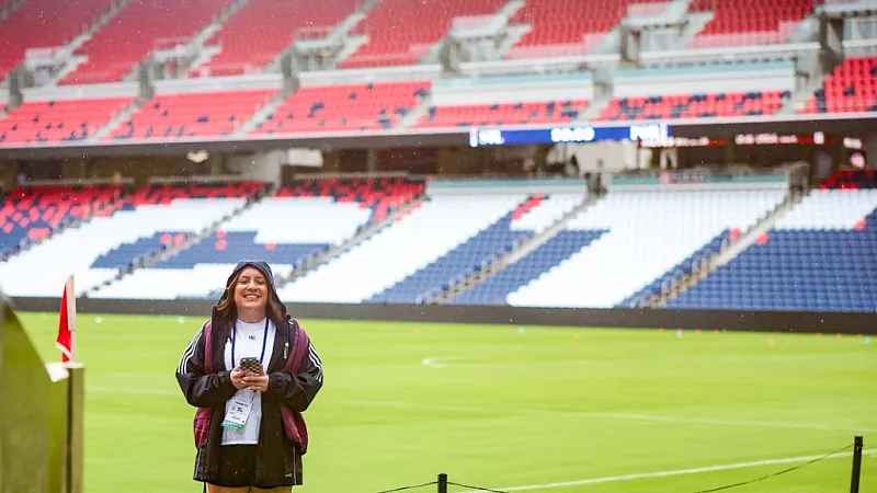 Vanesa Montalvo shoots behind-the-scenes content on field for the Portland Timbers.