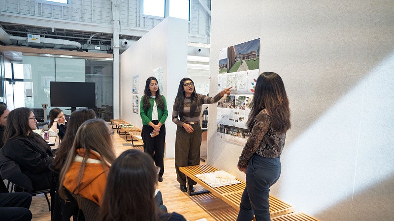Architecture students present their work in the gallery space of Highland Hall. 