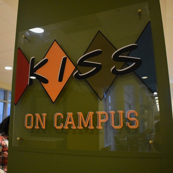 Kiss on Campus sign