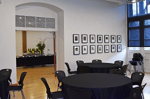 White Box White Box set up with round tables and the extra room set up with a buffet table.