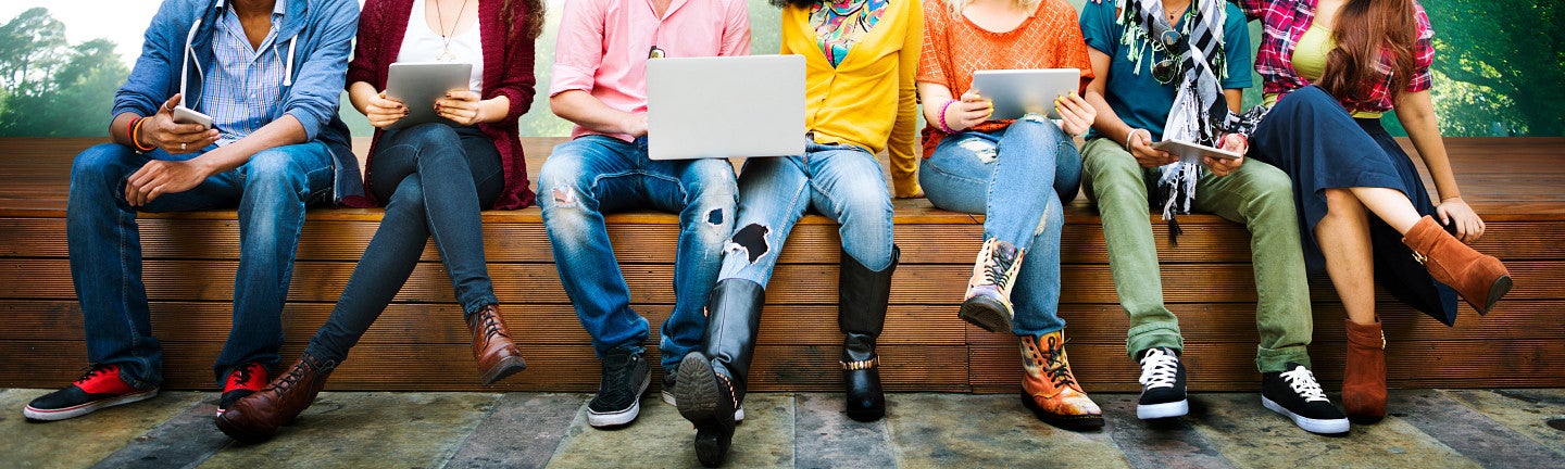 Students on bench stock image